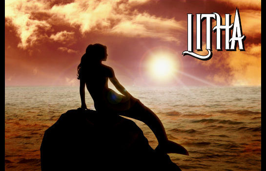 Mermaid on a rock overlooking the ocean